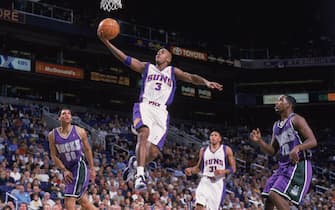 PHOENIX - NOVEMBER 25:  Stephon Marbury #3 of the Phoenix Suns moves in for the dunk during the game against the Milwaukee Bucks at American West Airlines on November 25, 2002 in Phoenix, Arizona. The Suns 85-81.  NOTE TO USER: User expressly acknowledges and agrees that, by downloading and/or using this Photograph, User is consenting to the terms and conditions of the Getty Images License Agreement. Mandatory copyright notice:  Copyright 2002 NBAE. (Photo by:  Barry Gossage/NBAE via Getty Images) 