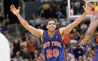 LOS ANGELES - FEBRUARY 16:  Allan Houston #20 of the New York Knicks celebrates during the NBA game against the Los Angeles Lakers at Staples Center on February 16, 2003 in Los Angeles, California.  The Knicks won 117-110.  NOTE TO USER: User expressly acknowledges and agrees that, by downloading and/or using this Photograph, User is consenting to the terms and conditions of the Getty Images License Agreement Mandatory Copyright Notice:  Copyright 2002 NBAE  (Photo by Andrew D. Bernstein/NBAE via Getty Images) 