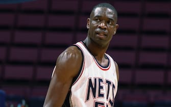 EAST RUTHERFORD, NJ - OCTOBER 15:  Dikembe Mutombo #55 of the New Jersey Nets looks on during the preseason game against the Boston Celtics on October 15, 2002 at the Continental Airlines Arena in East Rutherford, New Jersey. The Nets won 104-92.  NOTE TO USER:  User expressly acknowledges and agrees that, by downloading and /or using this Photograph, User is consenting to the terms and conditions of the Getty Images License Agreement.  Mandatory Copyright Notice:  Copyright 2002 NBAE  (Photo by Nathaniel S. Butler/NBAE via Getty Images)