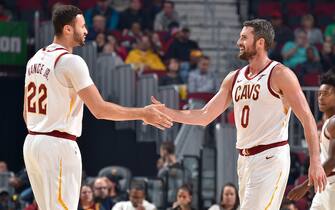 CLEVELAND, OH - OCTOBER 15: Larry Nance Jr. #22, and Kevin Love #0 of the Cleveland Cavaliers hi-five each other during a pre-season game against the Boston Celtics on October 15, 2019 at Rocket Mortgage FieldHouse in Cleveland, Ohio. NOTE TO USER: User expressly acknowledges and agrees that, by downloading and/or using this Photograph, user is consenting to the terms and conditions of the Getty Images License Agreement. Mandatory Copyright Notice: Copyright 2019 NBAE (Photo by David Liam Kyle/NBAE via Getty Images)