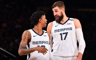 NEW YORK, NY - JANUARY 29: Ja Morant #12, and Jonas Valanciunas #17 of the Memphis Grizzlies talk to each other during the game against the New York Knicks on January 29, 2020 at Madison Square Garden in New York City, New York.  NOTE TO USER: User expressly acknowledges and agrees that, by downloading and or using this photograph, User is consenting to the terms and conditions of the Getty Images License Agreement. Mandatory Copyright Notice: Copyright 2020 NBAE  (Photo by Jesse D. Garrabrant/NBAE via Getty Images)