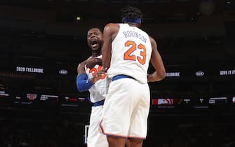 NEW YORK, NY - December 17: Julius Randle #30 and Mitchell Robinson #23 of the New York Knicks celebrate during the game against the Atlanta Hawks on December 17, 2019 at Madison Square Garden in New York City, New York.  NOTE TO USER: User expressly acknowledges and agrees that, by downloading and or using this photograph, User is consenting to the terms and conditions of the Getty Images License Agreement. Mandatory Copyright Notice: Copyright 2019 NBAE  (Photo by Nathaniel S. Butler/NBAE via Getty Images)