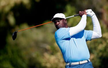 NORTH LAS VEGAS, NV - APRIL 03: NBA Legend Michael Jordan hits a tee shot during ARIA Resort & Casino's 13th Annual Michael Jordan Celebrity Invitational at Shadow Creek on April 3, 2014 in North Las Vegas, Nevada. (Photo by Isaac Brekken/Getty Images for Michael Jordan Celebrity Invitational)