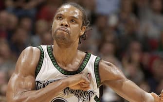 MINNEAPOLIS - APRIL 21:  Latrell Sprewell #8 of the Minnesota Timberwolves celebrates against the Denver Nuggets in game two of round one of the 2004 NBA Western Conference Playoffs at Target Center on April 21, 2004 in Minneapolis, Minnesota. NOTE TO USER: User expressly acknowledges and agrees that, by downloading and or using this photograph, User is consenting to the terms and conditions of the Getty Images License Agreement. (Photo by Garrett W. Ellwood/NBAE via Getty Images)