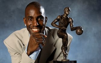 MINNEAPOLIS - MAY 3:  Kevin Garnett #21 of the Minnesota Timberwolves poses for an MVP portrait at Target Center on May 3, 2004 in Minneapolis, Minnesota. NOTE TO USER: User expressly acknowledges and agrees that, by downloading and/or using this Photograph, User is consenting to the terms and conditions of the Getty Images License Agreement. Mandatory Copyright Notice: Copyright 2004 NBAE (Photo by Jesse D. Garrabrant/NBAE via Getty Images)