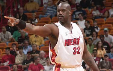 MIAMI - JANUARY 30:  Shaquille O'Neal #32 of the Miami Heat gestures against the Houston Rockets at American Airlines Arena on January 30, 2005 in Miami, Florida.  The Heat won 104-95.  NOTE TO USER: User expressly acknowledges and agrees that, by downloading and/or using this Photograph, user is consenting to the terms and conditions of the Getty Images License Agreement. Mandatory Copyright Notice: Copyright 2004 NBAE (Photo by Fernando Medina/NBAE via Getty Images) *** Local Caption *** Shaquille O'Neal