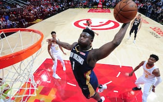 ATLANTA, GA - OCTOBER 7: Zion Williamson #1 of the New Orleans Pelicans dunks the ball against the Atlanta Hawks during a pre-season game on October 7, 2019 at State Farm Arena in Atlanta, Georgia. NOTE TO USER: User expressly acknowledges and agrees that, by downloading and/or using this Photograph, user is consenting to the terms and conditions of the Getty Images License Agreement. Mandatory Copyright Notice: Copyright 2019 NBAE (Photo by Scott Cunningham/NBAE via Getty Images)