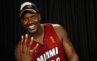 DALLAS - JUNE 20:  Shaquille O'Neal #32 of the Miami Heat poses for a portrait with the Larry O'Brien Championship trophy after their 95-92 Game Six victory of the 2006 NBA Finals against the Dallas Mavericks on June 20, 2006 at American Airlines Center in Dallas, Texas. NOTE TO USER: User expressly acknowledges and agrees that, by downloading and or using this photograph, User is consenting to the terms and conditions of the Getty Images License Agreement. Mandatory Copyright Notice: Copyright 2006 NBAE (Photo by Andrew D. Bernstein/NBAE via Getty Images)