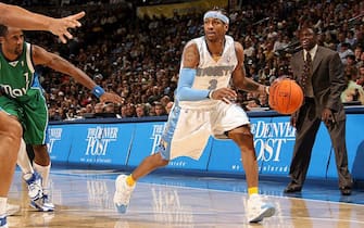 DENVER - DECEMBER 31:  Allen Iverson #3 of the Denver Nuggets controls the ball against the Dallas Mavericks on December 31, 2006 at the Pepsi Center in Denver, Colorado. The Mavericks defeated the Nuggets 89-85. NOTE TO USER: User expressly acknowledges and agrees that, by downloading and or using this photograph, User is consenting to the terms and conditions of the Getty Images License Agreement. Mandatory Copyright Notice: Copyright 2006 NBAE (Photo by Nathaniel S. Butler/NBAE via Getty Images)