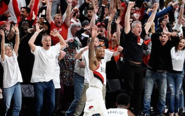 PORTLAND, OREGON - APRIL 23: Damian Lillard #0 of the Portland Trail Blazers waves goodbye to the Oklahoma City Thunder after hitting a last second 37 foot game winner to end Game Five of the Western Conference quarterfinals during the 2019 NBA Playoffs at Moda Center on April 23, 2019 in Portland, Oregon. The Blazers won 118-115.  NOTE TO USER: User expressly acknowledges and agrees that, by downloading and or using this photograph, User is consenting to the terms and conditions of the Getty Images License Agreement. (Photo by Steve Dykes/Getty Images)
