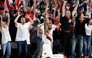 PORTLAND, OREGON - APRIL 23: Damian Lillard #0 of the Portland Trail Blazers waves goodbye to the Oklahoma City Thunder after hitting a last second 37 foot game winner to end Game Five of the Western Conference quarterfinals during the 2019 NBA Playoffs at Moda Center on April 23, 2019 in Portland, Oregon. The Blazers won 118-115. NOTE TO USER: User expressly acknowledges and agrees that, by downloading and or using this photograph, User is consenting to the terms and conditions of the Getty Images License Agreement. (Photo by Steve Dykes/Getty Images)