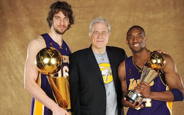 ORLANDO, FL - JUNE 14: Pau Gasol #16, Phil Jackson and Kobe Bryant #24 of the Los Angeles Lakers pose for a portrait after defeating the Orlando Magic in Game Five of the 2009 NBA Finals at Amway Arena on June 14, 2009 in Orlando, Florida. The Los Angeles Lakers defeated the Orlando Magic 99-86. NOTE TO USER: User expressly acknowledges and agrees that, by downloading and or using this photograph, User is consenting to the terms and conditions of the Getty Images License Agreement. Mandatory Credit: 2009 NBAE  (Photo by Andrew D. Bernstein/NBAE via Getty Images) *** Local Caption *** Pau Gasol; Phil Jackson; Kobe Bryant