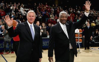 CLEVELAND - FEBRUARY 18:  1960 US Olympic basketball team captains Jerry West and Oscar Robertson receive a special award during the game between the Denver Nuggets and the Cleveland Cavaliers on February 18, 2010 at Quicken Loans Arena in Cleveland, Ohio.  The Nuggets won in overtime 118-116.  NOTE TO USER: User expressly acknowledges and agrees that, by downloading and/or using this Photograph, user is consenting to the terms and conditions of the Getty Images License Agreement. Mandatory Copyright Notice: Copyright 2010 NBAE (Photo by David Liam Kyle/NBAE via Getty Images)