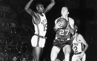 NEW YORK - 1958: Jack Twyman #27 of the Cincinnati Royals drives to the basket against the New York Knicks during an NBA game at Madison Square Garden in 1958 in New York. NOTE TO USER: User expressly acknowledges  and agrees that, by downloading and or using this  photograph, User is consenting to the terms and conditions of the Getty Images License Agreement. (Photo by NBA Photo Library/ NBAE/ Getty Images)