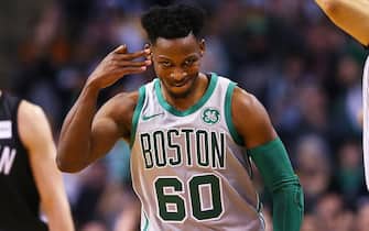 BOSTON, MA - APRIL 11:  Jonathan Gibson #60 of the Boston Celtics reacts after hitting a three-point shot as Nik Stauskas #2 of the Brooklyn Nets looks on during a game at TD Garden on April 11, 2018 in Boston, Massachusetts. NOTE TO USER: User expressly acknowledges and agrees that, by downloading and or using this photograph, User is consenting to the terms and conditions of the Getty Images License Agreement. (Photo by Adam Glanzman/Getty Images)