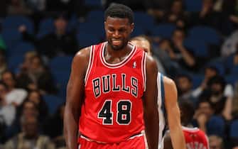 MINNEAPOLIS, MN - OCTOBER 13:  Nazr Mohammed #48 of the Chicago Bulls smiles as he walks on court during the game between the Minnesota Timberwolves and the Chicago Bulls during the preseason game on October 13, 2012 at Target Center in Minneapolis, Minnesota. NOTE TO USER: User expressly acknowledges and agrees that, by downloading and or using this Photograph, user is consenting to the terms and conditions of the Getty Images License Agreement. Mandatory Copyright Notice: Copyright 2012 NBAE (Photo by David Sherman/NBAE via Getty Images)