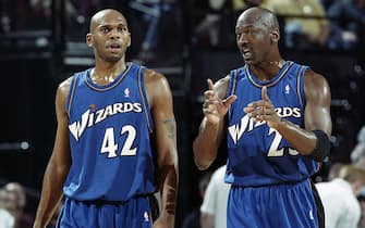 1906391 PORTLAND, OR - MARCH 25: Michael Jordan #23 of the Washington Wizards talks with teammate Jerry Stackhouse #42 during the NBA game against the Portland Trail Blazers at The Rose Garden on March 25, 2003 in Portland, Oregon. The Wizards won 95-91. NOTE TO USER: User expressly acknowledges and agrees that, by downloading and or using this Photograph, User is consenting to the terms and conditions of the Getty Images License Agreement. Mandatory Copyright Notice: Copyright 2003 NBAE (Photo by Sam Forencich/NBAE via Getty Images)