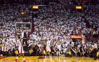 MIAMI, FL - JUNE 18: Ray Allen #34 of the Miami Heat hits a three-point shot to tie the score and send the San Antonio Spurs into overtime in Game Six of the 2013 NBA Finals on June 18, 2013 at American Airlines Arena in Miami, Florida. NOTE TO USER: User expressly acknowledges and agrees that, by downloading and or using this photograph, User is consenting to the terms and conditions of the Getty Images License Agreement. Mandatory Copyright Notice: Copyright 2013 NBAE (Photo by Nathaniel S. Butler/NBAE via Getty Images)