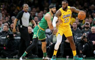 BOSTON, MASSACHUSETTS - JANUARY 20: Jayson Tatum #0 of the Boston Celtics defends LeBron James #23 of the Los Angeles Lakers at TD Garden on January 20, 2020 in Boston, Massachusetts. The Celtics defeat the Lakers 139-107.  (Photo by Maddie Meyer/Getty Images)
