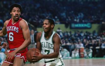 BOSTON - 1981:  Nate Archibald #7 of the Boston Celtics drives to the basket against Julius Erving #6 of the Philadelphia 76ers during a game played in 1981 at the Boston Garden in Boston, Massachusetts. NOTE TO USER: User expressly acknowledges and agrees that, by downloading and or using this photograph, User is consenting to the terms and conditions of the Getty Images License Agreement. Mandatory Copyright Notice: Copyright 1981 NBAE (Photo by Dick Raphael/NBAE via Getty Images)