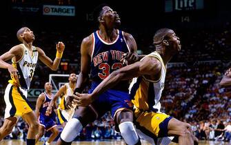 INDIANAPOLIS - MAY 30:  Patrick Ewing #33 of the New York Knicks battles for position against Antonio Davis #33 of the Indiana Pacers in Game Four of the Eastern Conference Finals during the 1994 NBA Playoffs at Market Square Arena on May 30, 1994 in Indianapolis, Indiana. The Pacers won 83-77.  NOTE TO USER: User expressly acknowledges that, by downloading and or using this photograph, User is consenting to the terms and conditions of the Getty Images License agreement. Mandatory Copyright Notice: Copyright 1994 NBAE (Photo by Nathaniel S. Butler/NBAE via Getty Images)