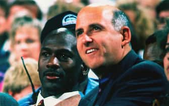 82572331 LOS ANGELES - 1992: Agent David Falk sits with Michael Jordan of the Chicago Bulls in 1992 in Los Angeles, California. NOTE TO USER:User expressly acknowledges and agrees that, by downloading and/or using this Photograph, user is consenting to the terms and conditions of the Getty Images License Agreement. Mandatory Copyright Notice: Copyright 1992 NBAE (Photo by Andrew D. Bernstein/NBAE via Getty Images)