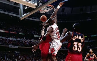 CHICAGO - 1997:  Michael Jordan #23 of the Chicago Bulls dunks against the Atlanta Hawks during Game Five, round two of the 1997 NBA Playoffs at the United Center in Chicago, Illinois.  NOTE TO USER: User expressly acknowledges and agrees that, by downloading and/or using this Photograph, User is consenting to the terms and conditions of the Getty Images License Agreement.  Mandatory Copyright Notice:  Copyright 1997 NBAE  (Photo by Scott Cunningham/NBAE via Getty Images) 
