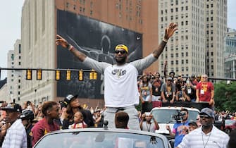 CLEVELAND, OH - JUNE 22:  LeBron James #23 of the Cleveland Cavaliers waves to the fans during the Cleveland Cavaliers Victory Parade And Rally on June 22, 2016 in downtown Cleveland, Ohio.  NOTE TO USER: User expressly acknowledges and agrees that, by downloading and/or using this Photograph, user is consenting to the terms and conditions of the Getty Images License Agreement. Mandatory Copyright Notice: Copyright 2016 NBAE  (Photo by David Liam Kyle/NBAE/Getty Images)