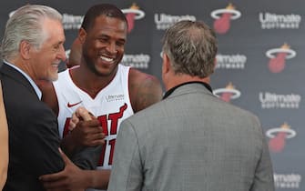 MIAMI, FL - SEPTEMBER 21:  Pat Riley, President of the Miami Heat, shakes hands with Dion Waiters #11 of the Miami Heat on stage during the announcement of the Miami Heat jersey sponsorship with Ultimate Software on September 21, 2017 in Miami, Florida. NOTE TO USER: User expressly acknowledges and agrees that, by downloading and/or using this photograph, user is consenting to the terms and conditions of the Getty Images License Agreement. Mandatory copyright notice: Copyright NBAE 2017 (Photo by Issac Baldizon/NBAE via Getty Images)