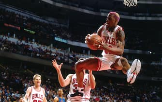 CHICAGO - MARCH 22: Dennis Rodman #91 of the Chicago Bulls rebounds  during a game played on March 22, 1997 at the United Center in Chicago, Illinois. NOTE TO USER: User expressly acknowledges and agrees that, by downloading and/or using this photograph, user is consenting to the terms and conditions of the Getty Images License Agreement.  Mandatory Copyright Notice: Copyright 1997 NBAE (Photo by Nathaniel S. Butler/NBAE via Getty Images)