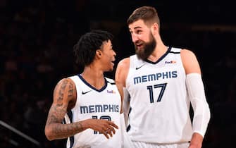 NEW YORK, NY - JANUARY 29: Ja Morant #12, and Jonas Valanciunas #17 of the Memphis Grizzlies talk to each other during the game against the New York Knicks on January 29, 2020 at Madison Square Garden in New York City, New York.  NOTE TO USER: User expressly acknowledges and agrees that, by downloading and or using this photograph, User is consenting to the terms and conditions of the Getty Images License Agreement. Mandatory Copyright Notice: Copyright 2020 NBAE  (Photo by Jesse D. Garrabrant/NBAE via Getty Images)