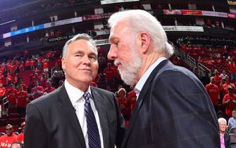 HOUSTON, TX - MAY 11: Gregg Popovich of the San Antonio Spurs shakes hands with Mike D'Antoni of the Houston Rockets after the game during Game Six of the Western Conference Semifinals of the 2017 NBA Playoffs on May 11, 2017 at the Toyota Center in Houston, Texas. NOTE TO USER: User expressly acknowledges and agrees that, by downloading and or using this photograph, User is consenting to the terms and conditions of the Getty Images License Agreement. Mandatory Copyright Notice: Copyright 2017 NBAE (Photo by Jesse D. Garrabrant/NBAE via Getty Images)