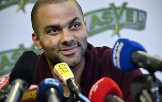 French basketball player Tony Parker gives a press conference at the ProA ASVEL basketball club's head office in Villeurbanne, central eastern France, on May 16, 2015 to speak about ASVEL and Spurs playing season and projects with the French basketball team. AFP PHOTO / ROMAIN LAFABREGUE        (Photo credit should read ROMAIN LAFABREGUE/AFP via Getty Images)