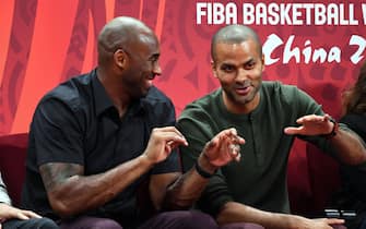 BEIJING, CHINA - SEPTEMBER 15: NBA Legends Kobe Bryant and Tony Parker talk during the 2019 FIBA World Cup Finals at the Cadillac Arena on September 15, 2019 in Beijing, China.  NOTE TO USER: User expressly acknowledges and agrees that, by downloading and/or using this Photograph, user is consenting to the terms and conditions of the Getty Images License Agreement. Mandatory Copyright Notice: Copyright 2019 NBAE (Photo by Garrett Ellwood/NBAE via Getty Images)