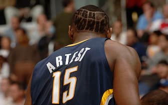 LOS ANGELES - NOVEMBER 27:  Ron Artest #15 of the Indiana Pacers is seen on court with the words "Tru Warier" (the name of Artest's record label) shaved in the back of his head against the Los Angeles Clippers November 27, 2005 at Staples Center in Los Angeles, California. The Pacers won 97-92.  NOTE TO USER: User expressly acknowledges and agrees that, by downloading and/or using this Photograph, user is consenting to the terms and conditions of the Getty Images License Agreement. Mandatory Copyright Notice: Copyright 2005 NBAE (Photo by Noah Graham/NBAE via Getty Images)