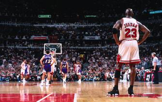 CHICAGO, IL - JUNE 12: Michael Jordan #23 of the Chicago Bulls looks on against the Utah Jazz during Game Five of the 1998 NBA Finals on June 12, 1998 at the United Center in Chicago, Illinois. NOTE TO USER: User expressly acknowledges and agrees that, by downloading and/or using this photograph, user is consenting to the terms and conditions of the Getty Images License Agreement. Mandatory Copyright Notice: Copyright 1998 NBAE (Photo by Andy Hayt/NBAE via Getty Images)