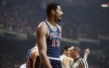 BOSTON - 1968:  Wilt Chamberlain #13 of the Philadelphia 76ers looks on against the Boston Celtics during a game played in 1968 at the Boston Garden in Boston, Massachusetts. NOTE TO USER: User expressly acknowledges and agrees that, by downloading and or using this photograph, User is consenting to the terms and conditions of the Getty Images License Agreement. Mandatory Copyright Notice: Copyright 1968 NBAE (Photo by Dick Raphael/NBAE via Getty Images)