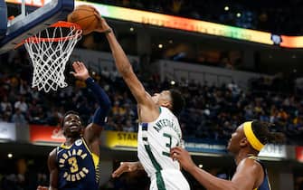 1188761724 INDIANAPOLIS, INDIANA - NOVEMBER 16: Giannis Antetokounmpo #34 of the Milwaukee Bucks dunks the ball in the game against the Indiana Pacers at Bankers Life Fieldhouse on November 16, 2019 in Indianapolis, Indiana. NOTE TO USER: User expressly acknowledges and agrees that, by downloading and/or using this Photograph, user is consenting to the terms and conditions of the Getty Images License Agreement. (Photo by Justin Casterline/Getty Images)