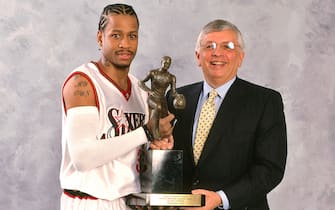 PHILADELPHIA, PA - MAY 16: Allen Iverson #3 of the Philadelphia 76ers receives the league MVP trophy from NBA Commissioner David Stern prior to the game against the Toronto Raptors during the Eastern Conference Finals at the First Union Center on May 16. 2001 in Philadelphia, Pennsylvania. NOTE TO USER: User expressly acknowledges and agrees that, by downloading and or using this photograph, user is consenting to the terms and conditions of the Getty Images License Agreement. Mandatory Copyright Notice: Copyright 2001 NBAE (Photo by Nathaniel S. Butler/NBAE via Getty Images)