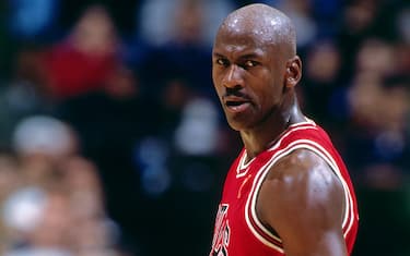 EAST RUTHERFORD, NJ - MARCH 14:  Michael Jordan #23 of the Chicago Bulls looks on during a game played on March 14, 1997 at Continental Airlines Arena in East Rutherford, New Jersey. NOTE TO USER: User expressly acknowledges and agrees that, by downloading and/or using this photograph, user is consenting to the terms and conditions of the Getty Images License Agreement.  Mandatory Copyright Notice: Copyright 1997 NBAE (Photo by Nathaniel S. Butler/NBAE via Getty Images)