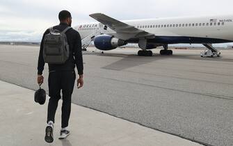 SALT LAKE CITY, UT - MARCH 05:  Derrick Favors #15 of the Utah Jazz arrives to the charter plane on the way to play the New Orleans Pelicans on March 05, 2019 in Salt Lake City, Utah. NOTE TO USER: User expressly acknowledges and agrees that, by downloading and or using this Photograph, User is consenting to the terms and conditions of the Getty Images License Agreement. Mandatory Copyright Notice: Copyright 2019 NBAE (Photo by Melissa Majchrzak/NBAE via Getty Images)