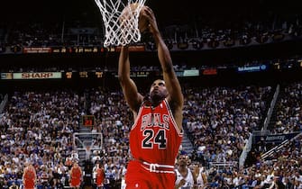 SALT LAKE CITY - JUNE 3:  Scott Burrell #24 of the Chicago Bulls takes the ball to the basket against the Utah Jazz in Game One of the 1998 NBA Finals at the Delta Center on June 3, 1998 in Salt Lake City, Utah.  The Jazz won 88-85 in overtime.  NOTE TO USER: User expressly acknowledges that, by downloading and or using this photograph, User is consenting to the terms and conditions of the Getty Images License agreement. Mandatory Copyright Notice: Copyright 1998 NBAE (Photo by Andrew D. Bernstein/NBAE via Getty Images)