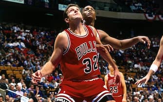 EAST RUTHERFORD, NJ  - 1995:  Will Perdue #32 of the Chicago Bulls battles for position against Derrick Coleman #44 of the New Jersey Nets during a game played in 1995 at Continental Airlines Arena in East Rutherford, New Jersey. NOTE TO USER: User expressly acknowledges that, by downloading and or using this photograph, User is consenting to the terms and conditions of the Getty Images License agreement. Mandatory Copyright Notice: Copyright 1995 NBAE (Photo by Courtesy of Noren Trotman/NBAE via Getty Images)