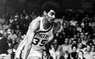 92311728 INDIANAPOLIS - CIRCA 1967: Roger Brown #35 of the Indiana Pacers dribbles the ball during a game played circa 1967 at Market Square Arena in Indianapolis, Indiana. NOTE TO USER: User expressly acknowledges and agrees that, by downloading and or using this photograph, User is consenting to the terms and conditions of the Getty Images License Agreement. Mandatory Copyright Notice: Copyright 1967 NBAE (Photo by NBA Photos/NBAE via Getty Images)