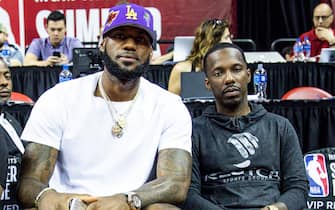 LAS VEGAS, NEVADA - JULY 05: (L-R) Ernie Ramos, LeBron James and Rich Paul sit court side at NBA Summer League on July 05, 2019 in Las Vegas, Nevada. NOTE TO USER: User expressly acknowledges and agrees that, by downloading and or using this Photograph, user is consenting to the terms and conditions of the Getty Images License Agreement.  (Photo by Cassy Athena/Getty Images)
