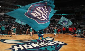 CHARLOTTE, NC - OCTOBER 20: The Charlotte Hornets mascot waves the team flag before the game against the Atlanta Hawks on October 20, 2017 at Spectrum Center in Charlotte, North Carolina. NOTE TO USER: User expressly acknowledges and agrees that, by downloading and or using this photograph, User is consenting to the terms and conditions of the Getty Images License Agreement.  Mandatory Copyright Notice:  Copyright 2017 NBAE (Photo by Kent Smith/NBAE via Getty Images)