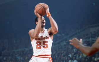 BALTIMORE, MD - CIRCA 1970:  Gus Johnson #25 of the Baltimore Bullets goes up to shoot during an NBA basketball game circa 1970 at the Baltimore Civic Center in Baltimore, Maryland. Johnson played for the Bullets from 1963-72. (Photo by Focus on Sport/Getty Images) *** Local Caption *** Gus Johnson