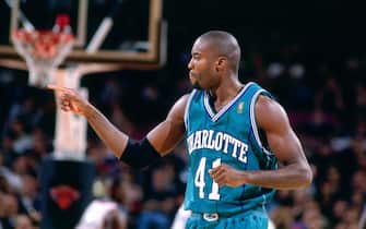 NEW YORK CITY - FEBRUARY 2: Glen Rice #41 of the Charlotte Hornets points  during a game played on February 2, 1997 at Madison Square Garden in New York City. NOTE TO USER: User expressly acknowledges and agrees that, by downloading and/or using this photograph, user is consenting to the terms and conditions of the Getty Images License Agreement.  Mandatory Copyright Notice: Copyright 1997 NBAE (Photo by Nathaniel S. Butler/NBAE via Getty Images)
