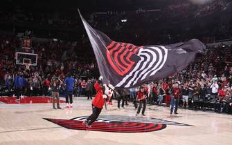 PORTLAND, OR - OCTOBER 26: The Portland Trail Blazers mascot waves the team flag before the game against the LA Clippers on October 26, 2017 at the Moda Center in Portland, Oregon. NOTE TO USER: User expressly acknowledges and agrees that, by downloading and or using this Photograph, user is consenting to the terms and conditions of the Getty Images License Agreement. Mandatory Copyright Notice: Copyright 2017 NBAE (Photo by Sam Forencich/NBAE via Getty Images)