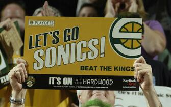 SEATTLE - APRIL 23:  A Seattle SuperSonics fan cheers in Game one of the Western Conference Quarterfinals against the Sacramento Kings during the 2005 NBA Playoffs on April 23, 2005 at Key Arena in Seattle, Washington.  The Sonics won 87-82 to lead the series 1-0. NOTE TO USER: User expressly acknowledges and agrees that, by downloading and/or using this photograph, User is consenting to the terms and conditions of the Getty Images License Agreement. Mandatory copyright notice: Copyright 2005 NBAE  (Photo by Otto Greule Jr/Getty Images)